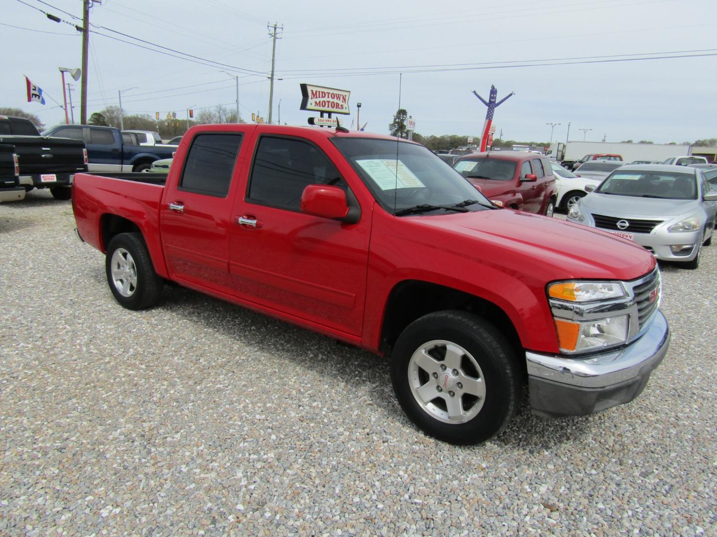 2012 Red /Gray GMC Canyon SLE Crew Cab 2WD (1GTD5MF9XC8) with an 2.9L L4 DOHC 16V engine, Automatic transmission, located at 15016 S Hwy 231, Midland City, AL, 36350, (334) 983-3001, 31.306210, -85.495277 - Photo#0